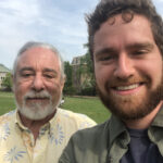 Charlie Mirsky smiles in a selfie with Prof. Newman.