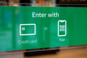 Signage reads: Enter with credit card or app