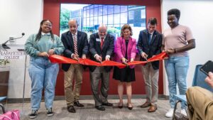 Image of Lafayette College officials cutting the ribbon at the Hugel Welcome Center dedication ceremony