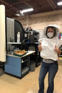Lafayette engineering alum Lara Lash '13 dressed in protective gear while conducting research at NASA Ames Research Center