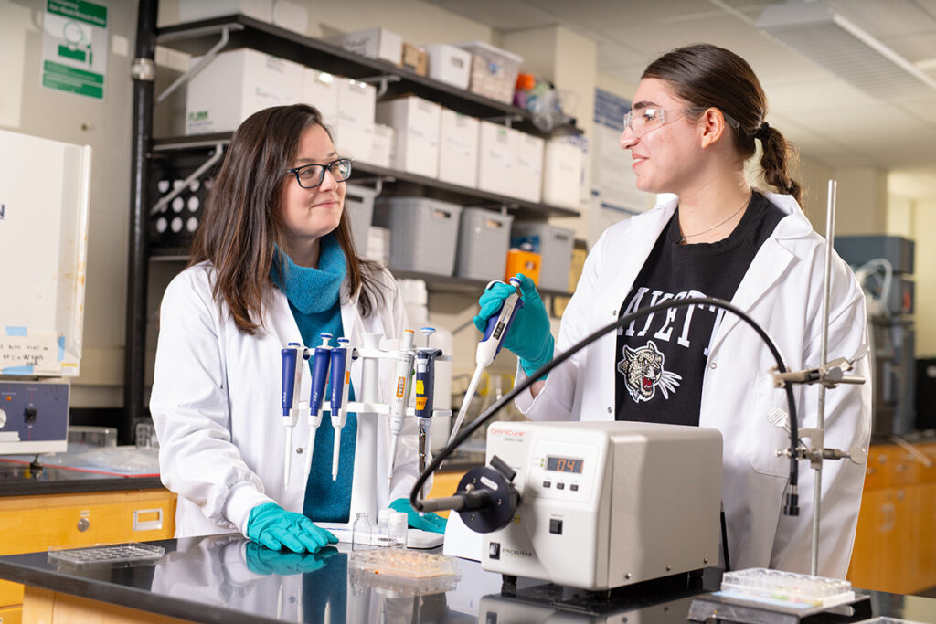 A student and her professor in chemical engineering