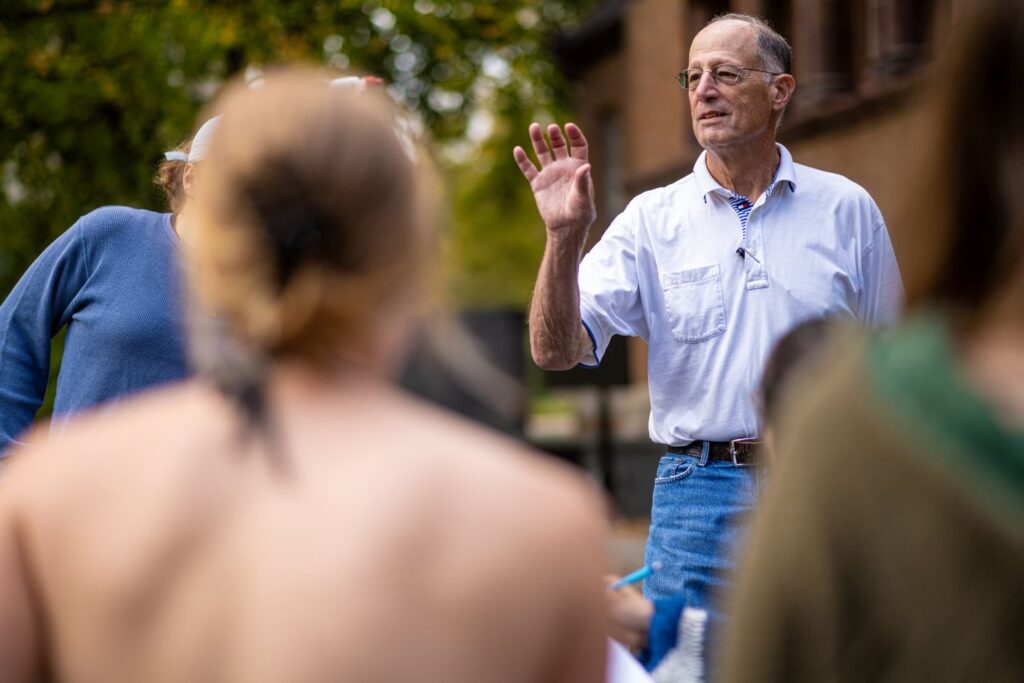 Lawrence Malinconico, associate professor of geology/geophysics, leads an outdoor class. | Photo by Adam Atkinson