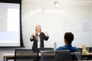 Prof. Sarah Appelhans addressing the audience at the EGRS 451 capstone presentation