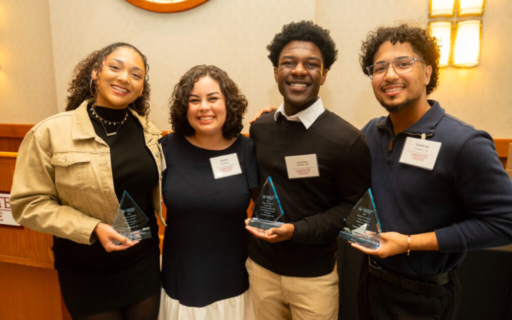 Students hold awards