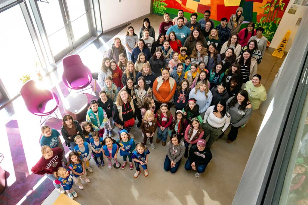 Group photo of Girl Scouts and Lafayette faculty, staff, and student volunteers on Girl Scout Badge Day