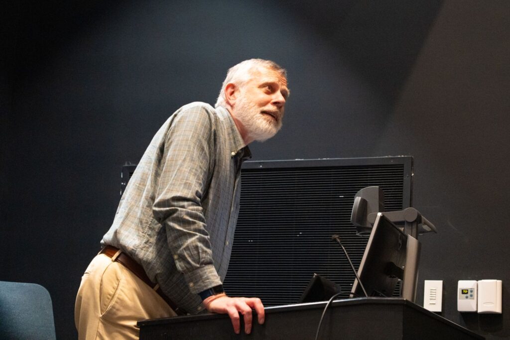 Rob Root, professor of mathematics, introduced the film. | Photo by JaQuan Alston