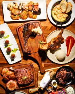 A view from above of several Greek food dishes from Meli