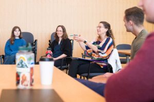 Prof. Rebekah Pite having a discussion with students during her Global Stimulants course