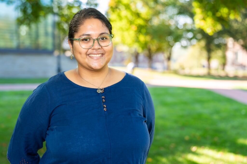 Portrait of Avani Sukhtankar taken outside on campus.