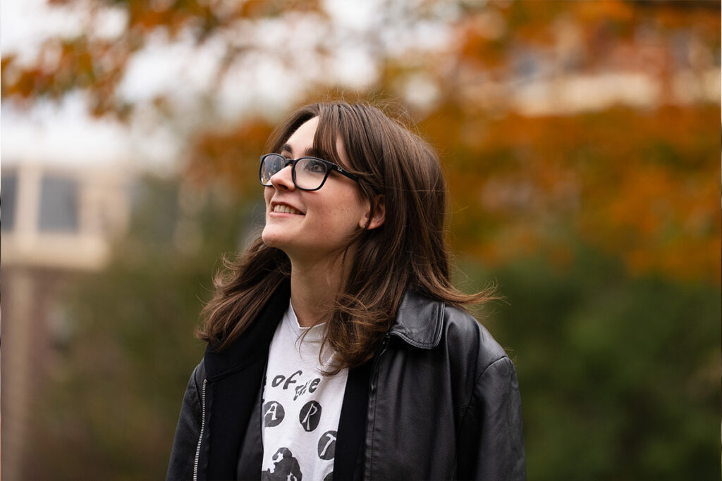 McKenna Graf ’26 stands in front of Pardee Hall on the Quad during the fall.