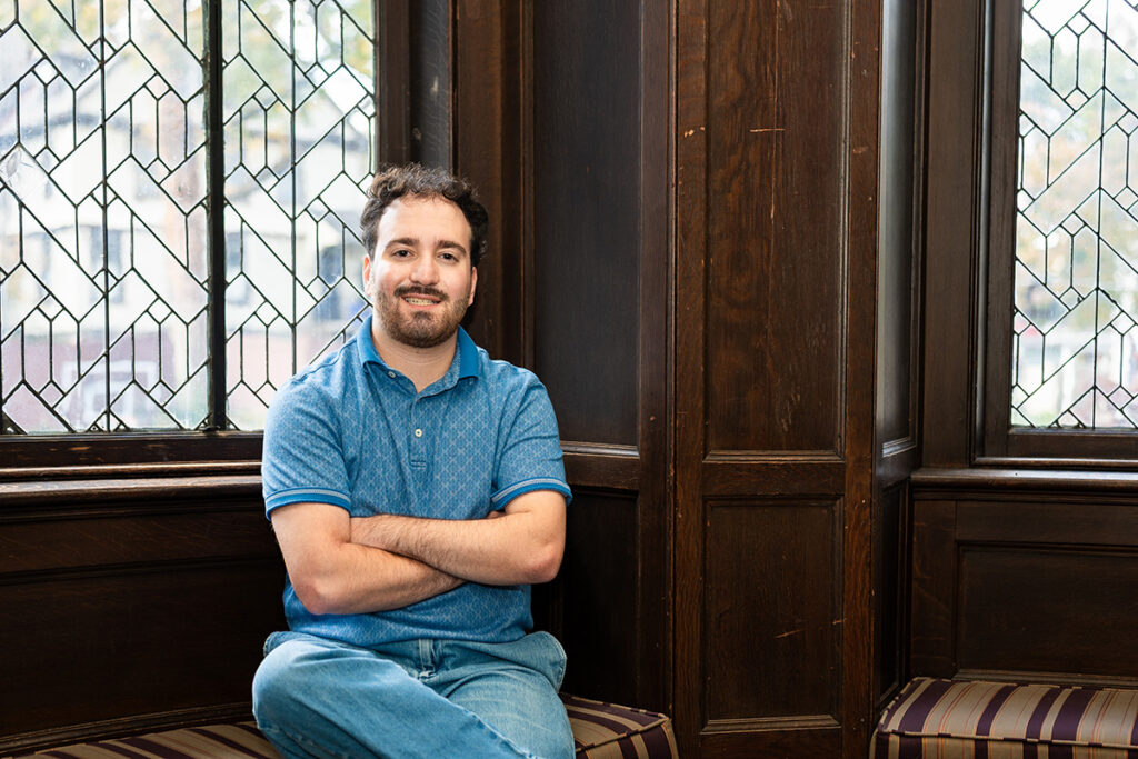 Christopher Byrnes ’26 sits in the McKelvy House