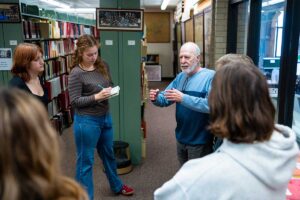 Experts at the Easton Area Public Library talking to students about archival research