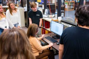 Experts at the Easton Area Public Library showing Anthropology of the City students the various digitized archival resources that are available to them there