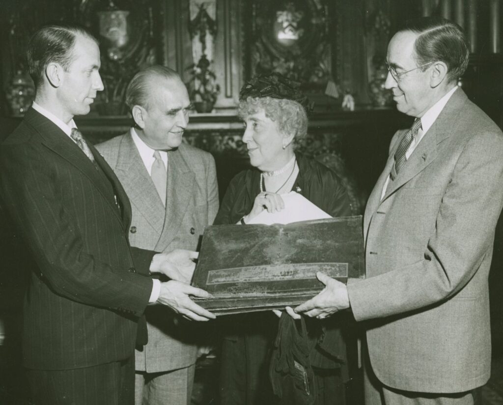 Helen Fahnestock Hubbard presented her collection of letters to Lafayatte College in 1943. Pictured during the ceremony, left to right: : the Count de Chambrun, great-great-grandson of the Marquis de Lafayette, Messmore Kendall, founder and president of the American Friends of Lafayette, Helen Fahnestock Hubbard, and Dr. William Mather Lewis, Lafayette College president, 1927-1945. | Photo courtesy of Special Collections and College Archives