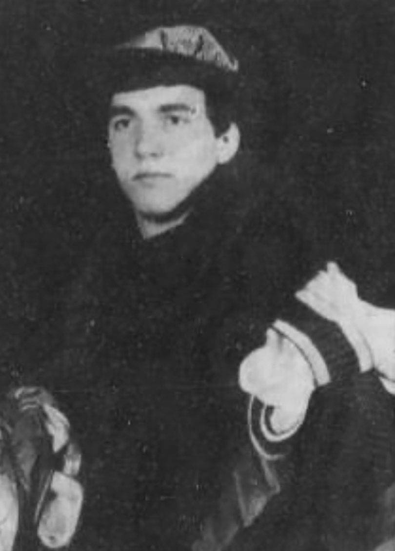 Brad Lewis ’87 is dressed in a medieval costume and wearing a hat.