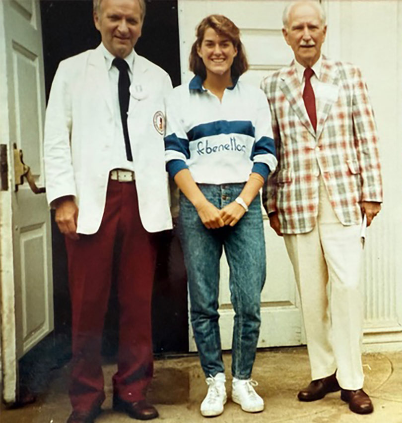 Kristen ’86 (center) is standing with her grandfather, Roswell Corwin '25, and great uncle, Harold Corwin ’35, when they were on campus for their 50th and 60th reunions. Kristen is wearing a white Bennetton shirt.