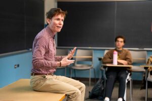 Prof. Mathieu Smith-Perrot lecturing to students in the classroom during his First-Year Seminar The Boring Class