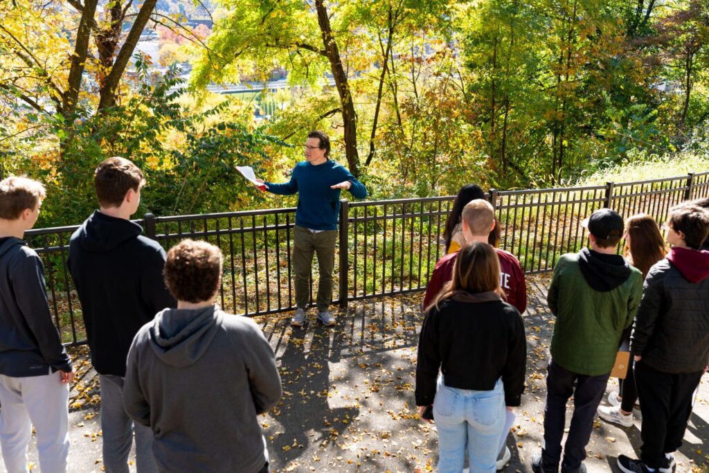 Mike McGuire addresses students on the escarpment trail