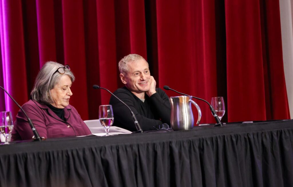 Artist Brian Booth Craig, with Diane Shaw, reflects on the Adrienne sculpture, which he was assigned to finish by Audrey Flack, his friend and mentor. | Photo by Ashli Truchon Novak