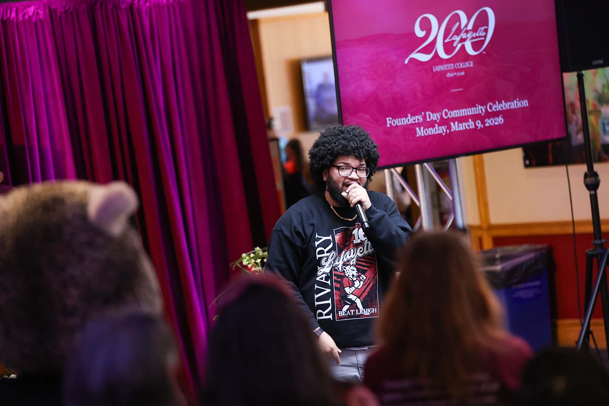 Teo Rodriquez performs with a microphone