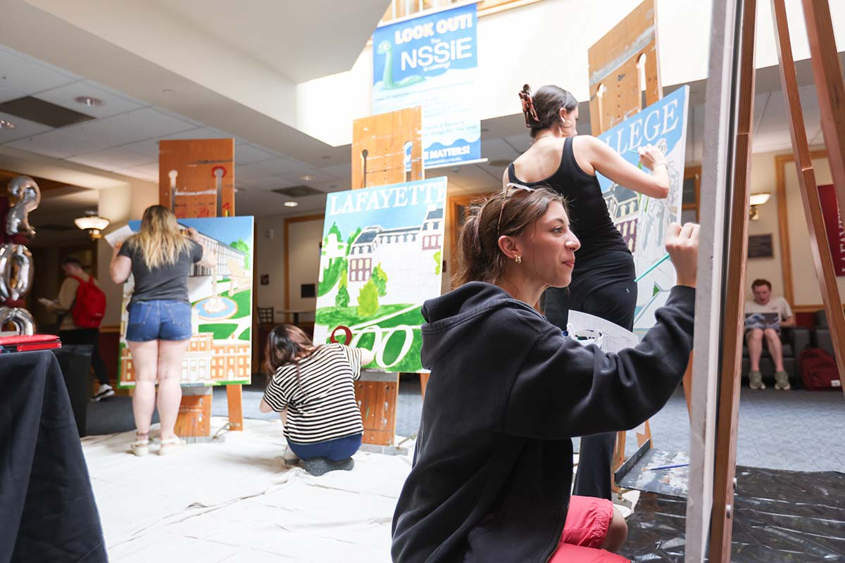 Students paint canvases depicting Lafayette scenes