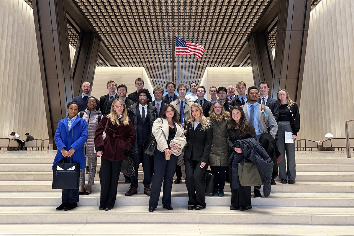Students stand on steps during their Career Tracks 