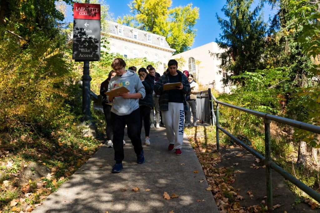 Students observe and take notes along escarpment trail.
