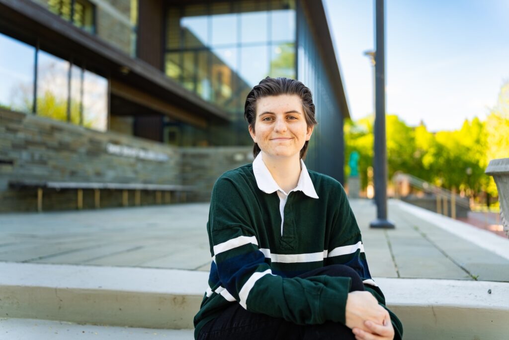 Syd Friedman is pictured outside on the steps of Skillman Library