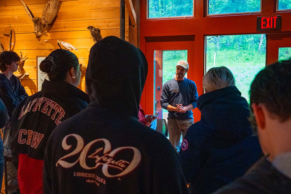 A person gives a presentation at the nature center to Lafayette students