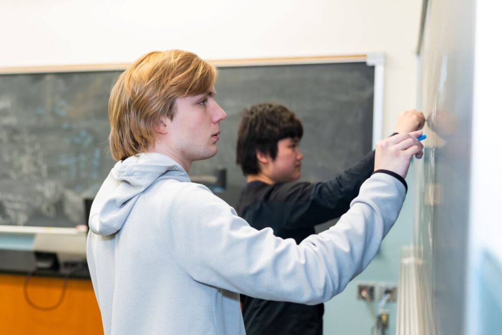 A shared spirit of mathematical collaboration for Turner Day ’28 and Trung Nguyen ’29. | Photo by JaQuan Alston
