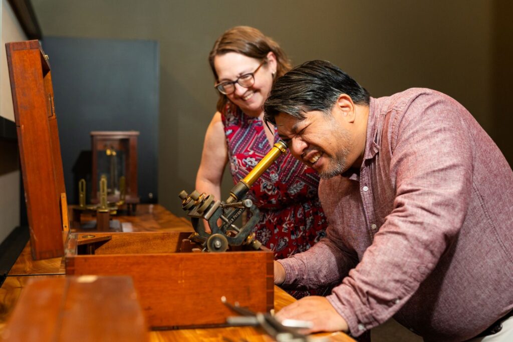 Rico Reyes, director of art galleries and curator of art collections, and Jenn Stroud Rossmann, Jeffers Dean of Engineering and Baird Professor of Mechanical Engineering, collaborated on Engineering Artifacts: Past, Present, & Future exhibit, which runs through Dec. 4. (Photo | JaQuan Alston)