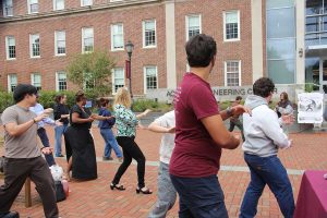 Lafayette community members participating in an open demonstration of taiji, qigong, and acupuncture in Anderson Courtyard in fall 2026, led by Seng Kan Cheung
