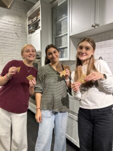 (Featured left to right) Cydney Fink ‘29, Elizabeth Silletti ‘30, and Ellah Kohler ‘30 participate in the Meals at the Market program.
