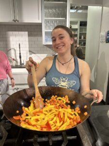 Amelia Leber ‘29 sautees fresh veggies in the Easton Public Market kitchen