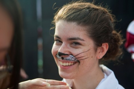 A student gets her face painted during the annual Block pARTy