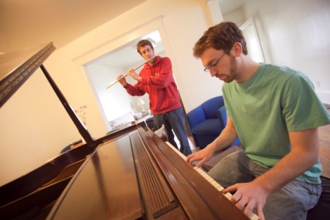 During an Arts House jam session, Mike Follett ’11 plays the flute and Andy Feldman ’11 plays the piano