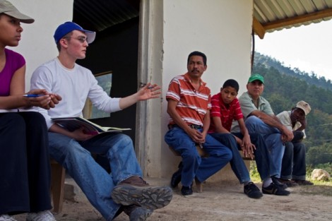 Richie Durham ’11 holds a meeting with the villagers.