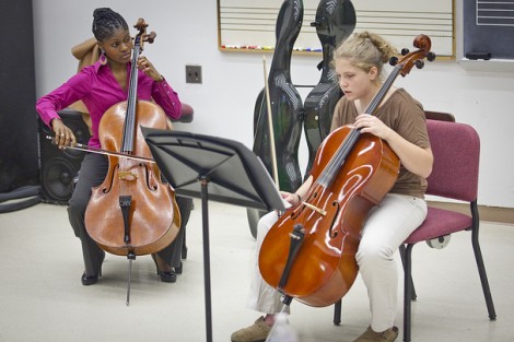 Award-winning cellist Patrice Jackson holds a strings master class for students including Rachel Loven '14.