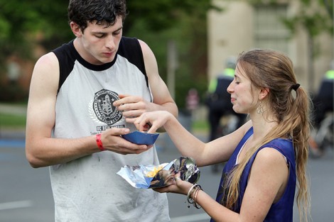 Evan Bailey '12 and Julia Ben-Asher '14 share some food.
