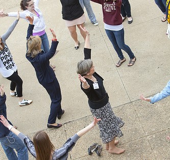 Reunion attendees join in the flash mob dance outside Pfenning Alumni Center.