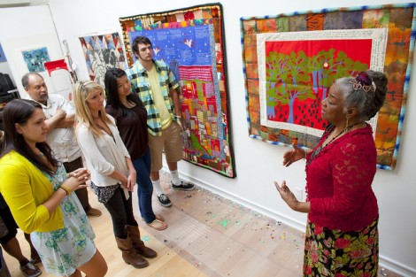 Faith Ringgold, right, speaks with the students about her artwork.