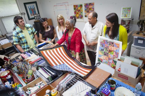 The students and Professor Curlee Holton present the Oprah We Love print to Faith Ringgold.
