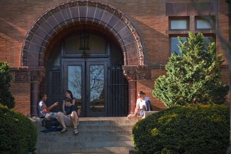 Students hang out on the steps of Van Wickle Hall.