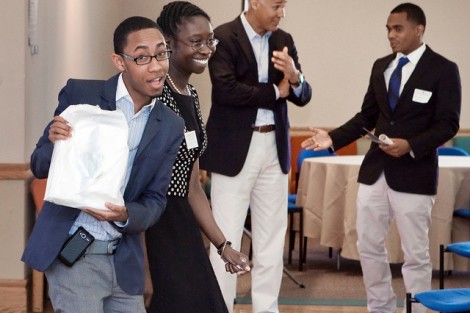 Kristian Smith '13 reacts after winning an iPad in a raffle.