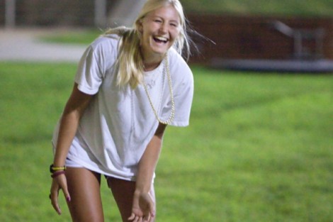 Ashley Kunow '15 laughs after dropping a water balloon.
