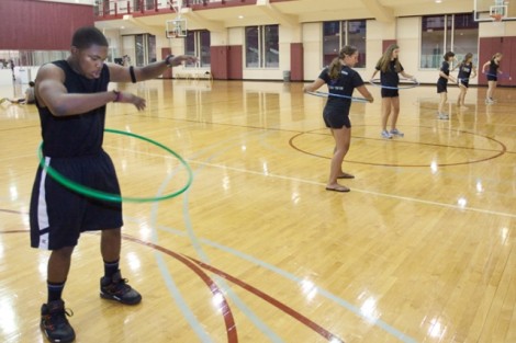 William Omorogieva '15 competes in a hula hoop event.