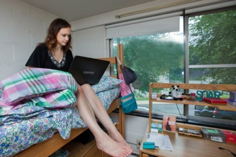Julie Campbell '15 works on her laptop inside Conway House.