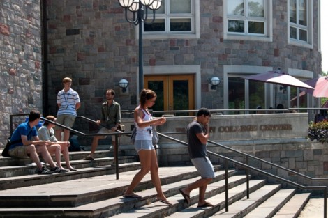 Students walk out of Farinon College Center.