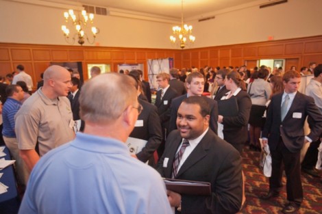 Students and alumni mingle during the annual Career Fair in Marquis Hall.
