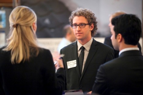 Brent Hoagland, a biology and economics double major, speaks with prospective employers.
